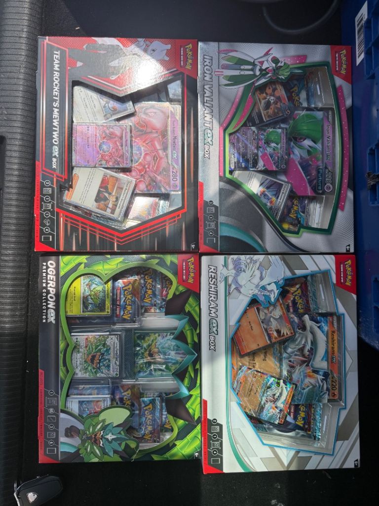 4 Pokémon TCG Boxes - Team Rocket's Mewtwo, Iron Valiant, Ogerpon, Reshiram GX