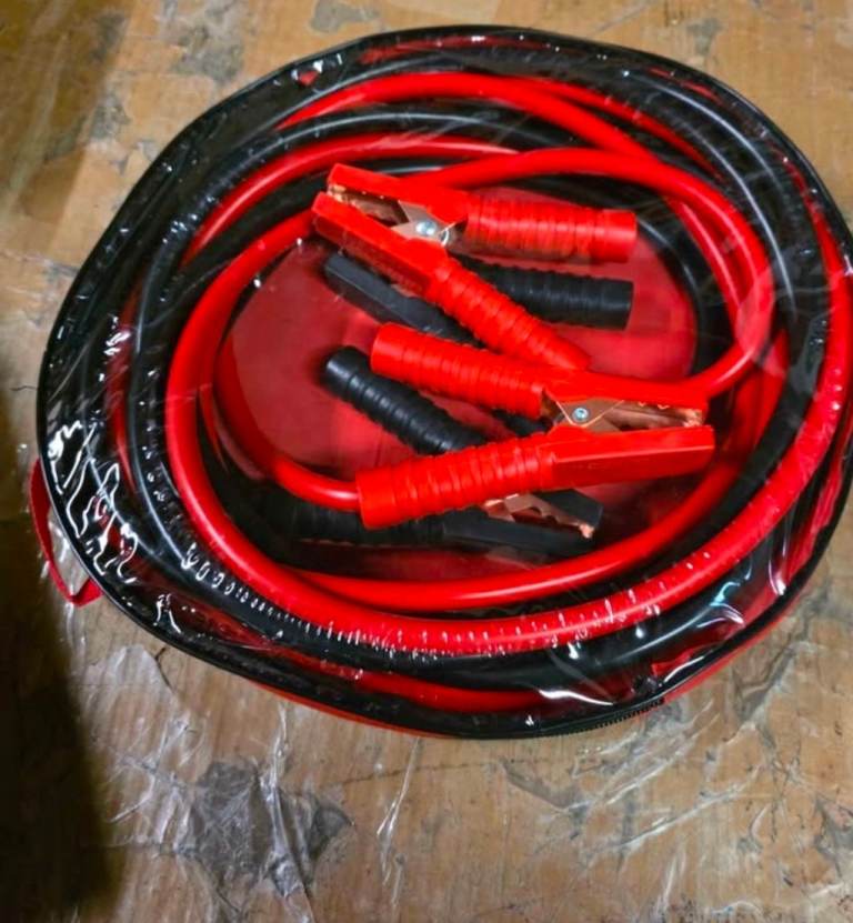 A new still in its own carrying case 4 M 1800AMP Heavy Duty Battery Jump 