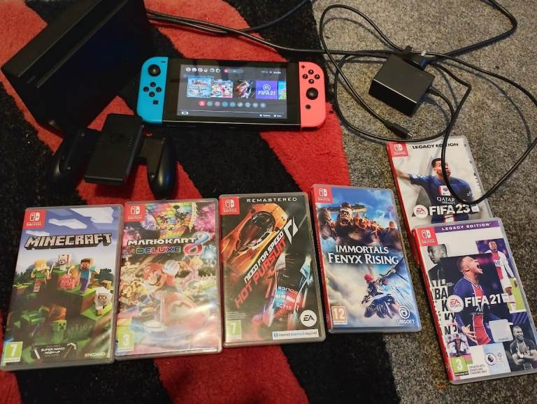 Nintendo Switch 1 + accessories and games