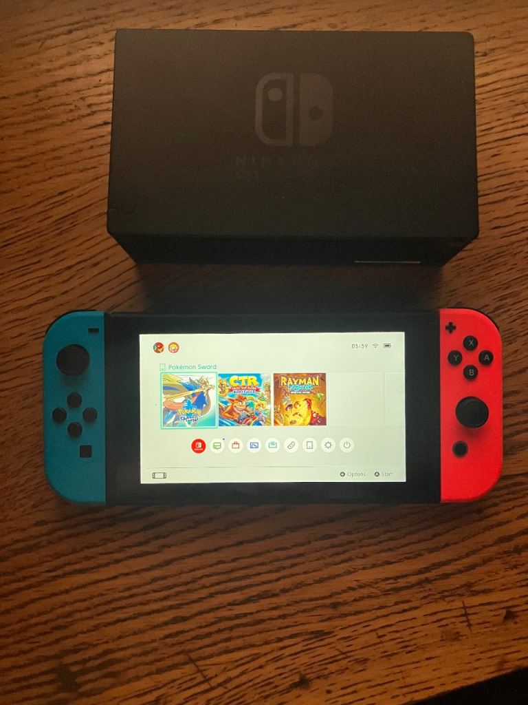 Nintendo Switch Console with Joy-Cons and Steering Wheels with 3 games! all wires included!