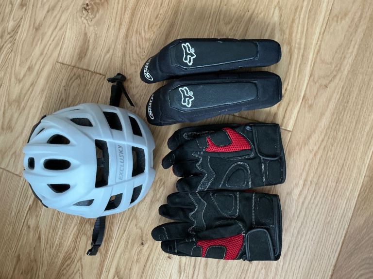 Cycle helmet ,gloves and elbow protectors.