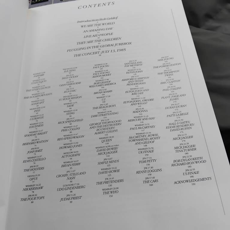 LIVE AID TOUR BOOK SIGNED 