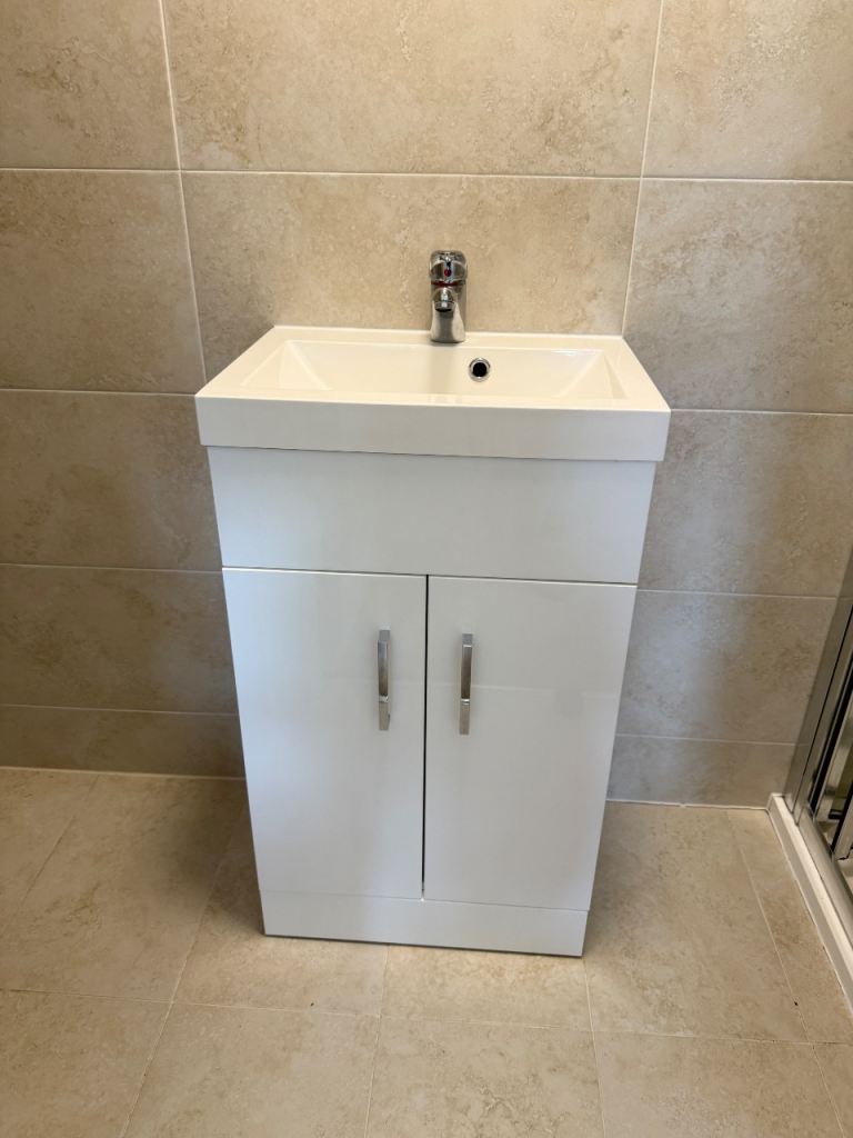 White Bathroom Sink with Cabinet – Good Condition