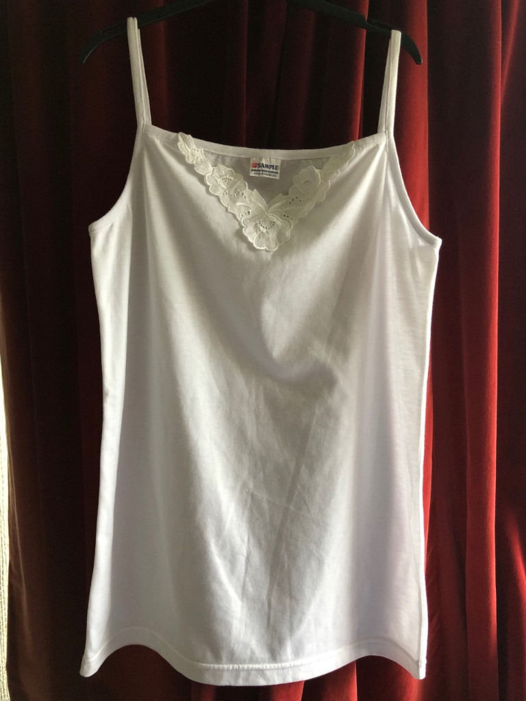Women’s white long vest top.  Size 12.