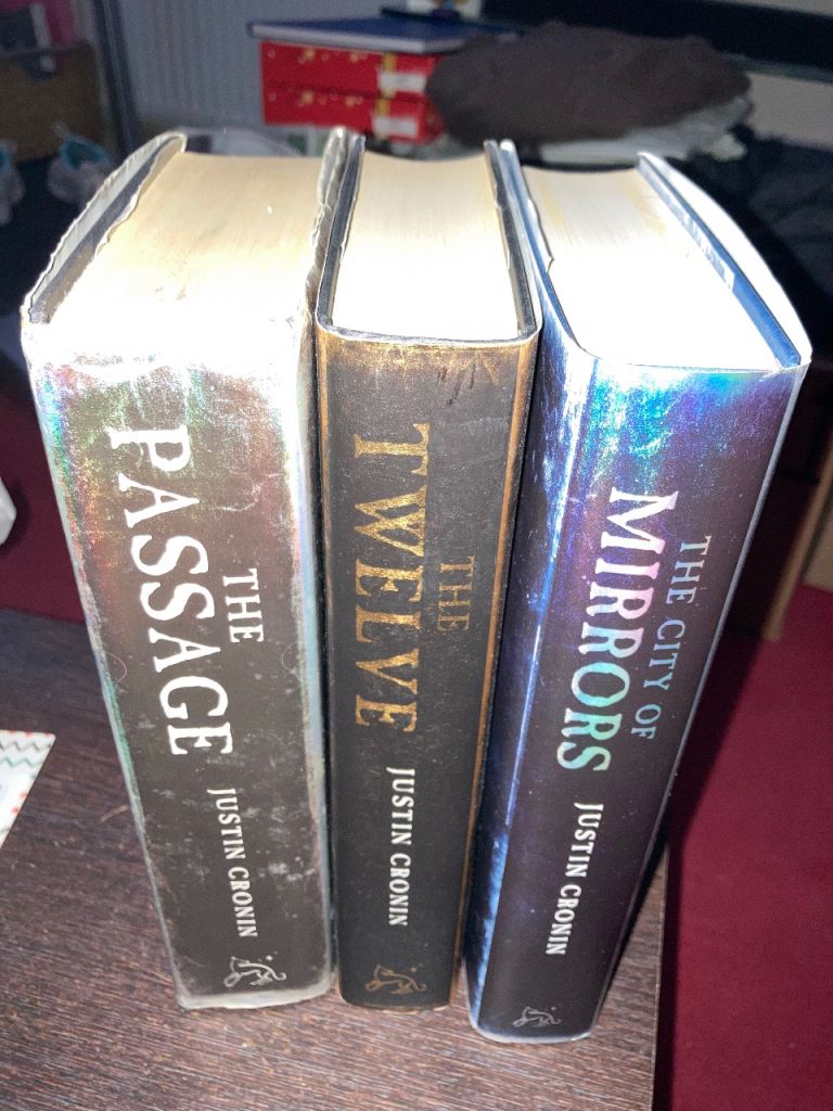 The Passage trilogy Justin Cronin. Used 