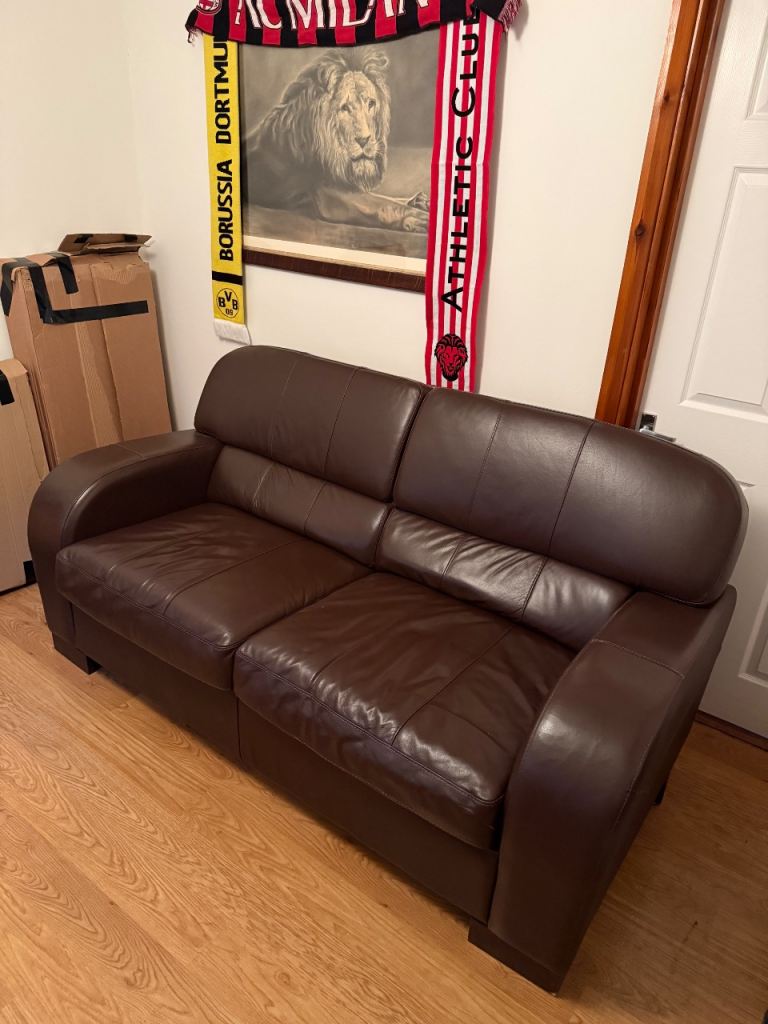 Brown leather sofa bed