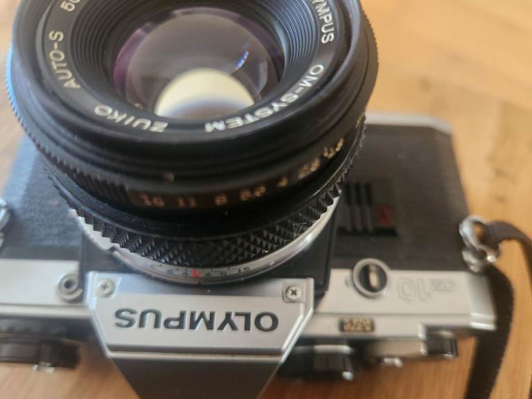 Title: Olympus OM-10 35mm Film Camera + Olympus Zuiko 50mm f/1.8 Lens – Tested Working