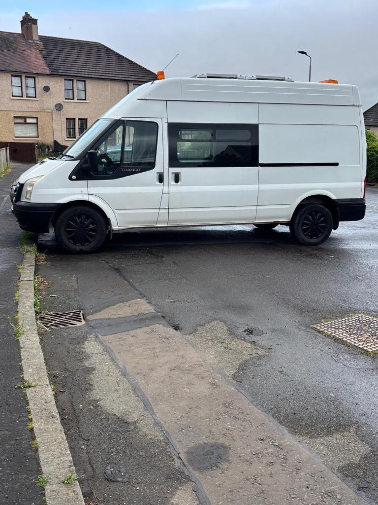 Ford transit van with solar panels and leisure batteries 