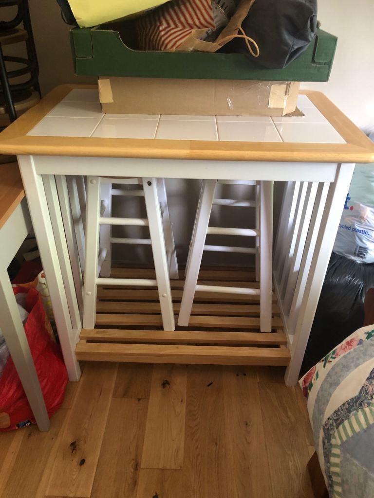 Breakfast table with 2 stools