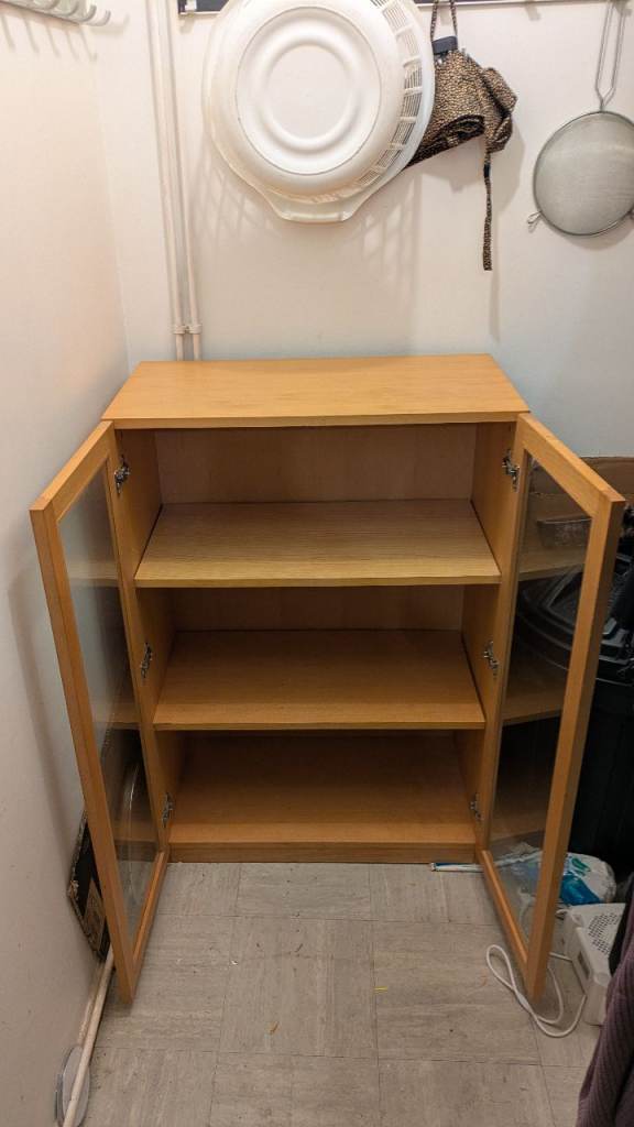 Wooden Cabinet with Glass Doors – Good Condition