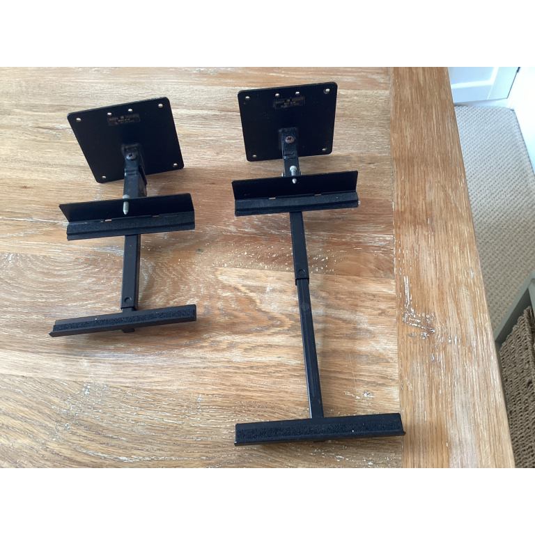 Wall-mounted speaker brackets