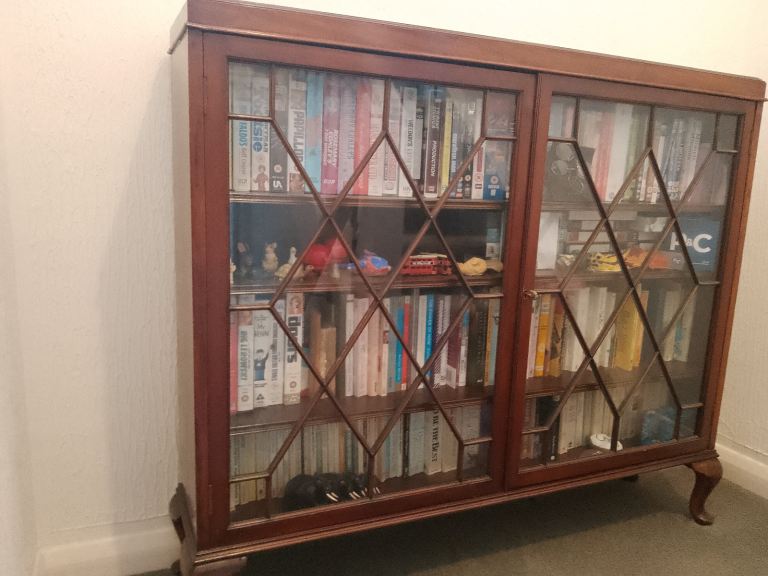 Antique bookcase / display cabinet with glass doors and wooden shelves