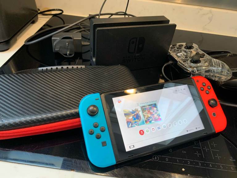 Nintendo Switch Console with Joy-Cons, Dock, and Games Case