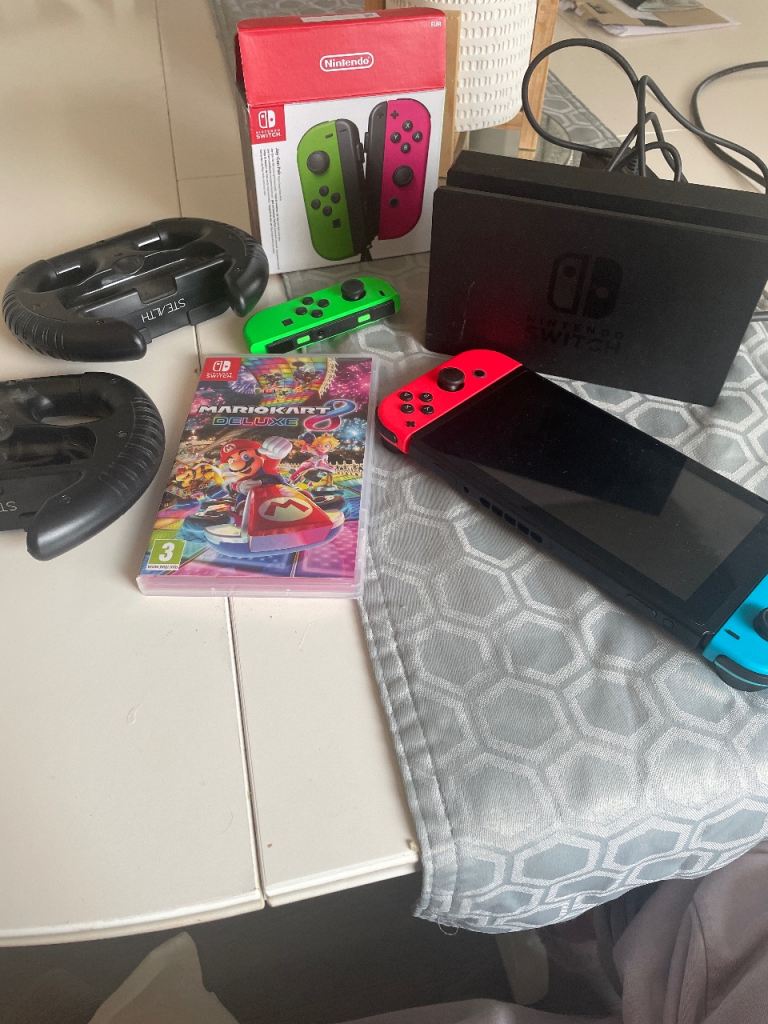 Nintendo Switch Console with Mario Kart 8 Deluxe and Extra Joy-Cons