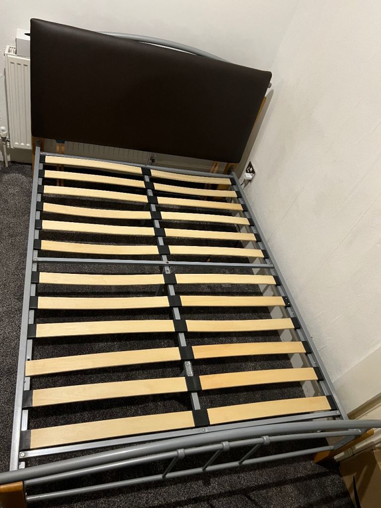 Double Metal Bed Frame with a Headboard – Good Condition