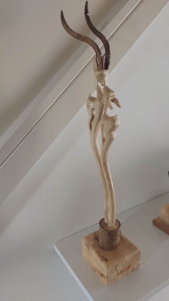 Unique Decorative Wooden Sculpture with Horn-like Details