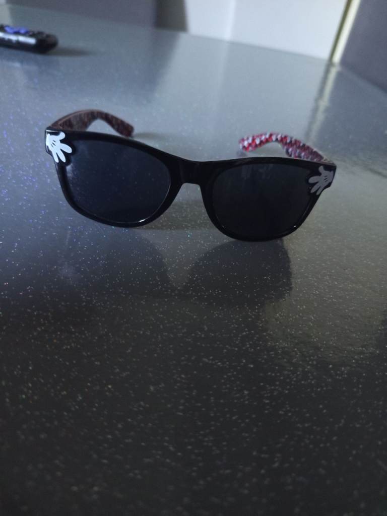 Black Sunglasses with Patterned Arms – Good Condition