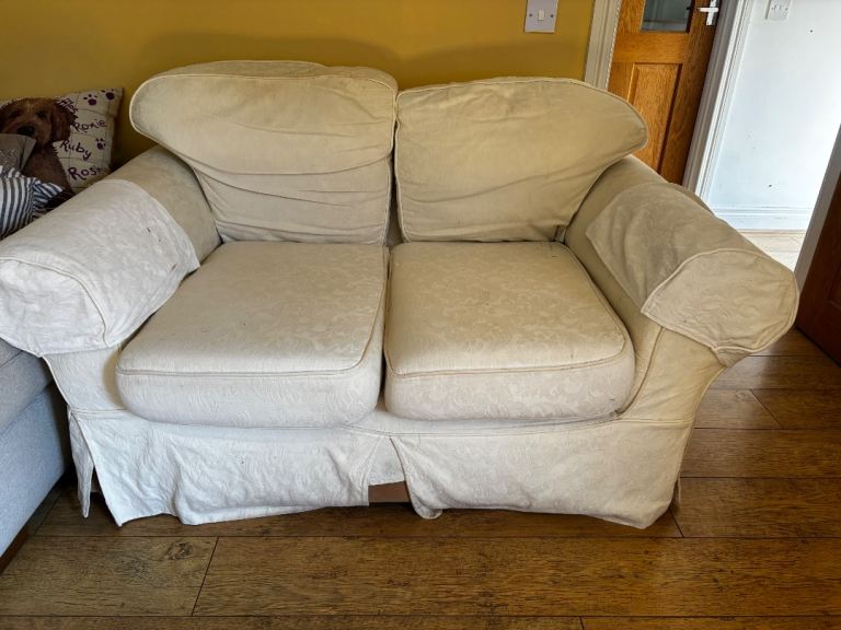 Cream Two-Seater Sofa – Good Condition