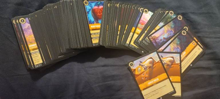 Disney lorcana 200 common 100 uncommon amber cards