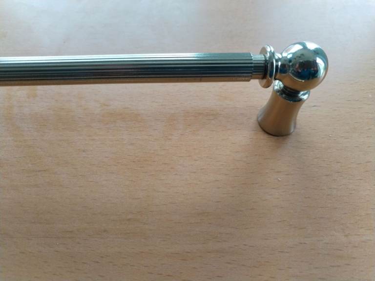 Extendable metal curtain pole with fittings