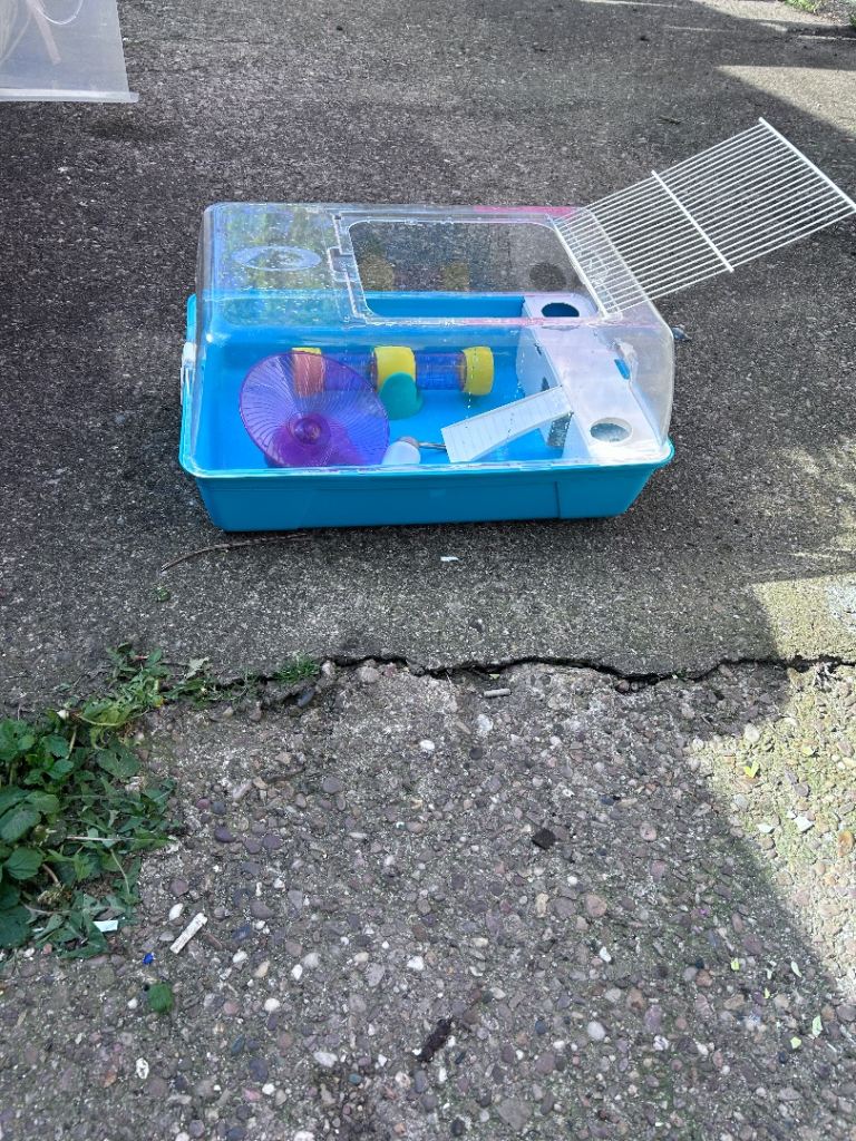 Plastic hamster cage with tube