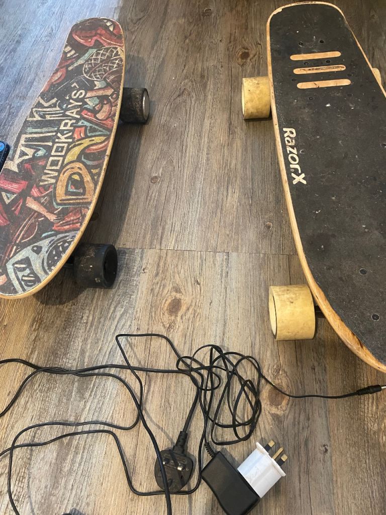 RazorX Electric Skateboard  x2 boards parts or repair…- Fair Condition, with Charger