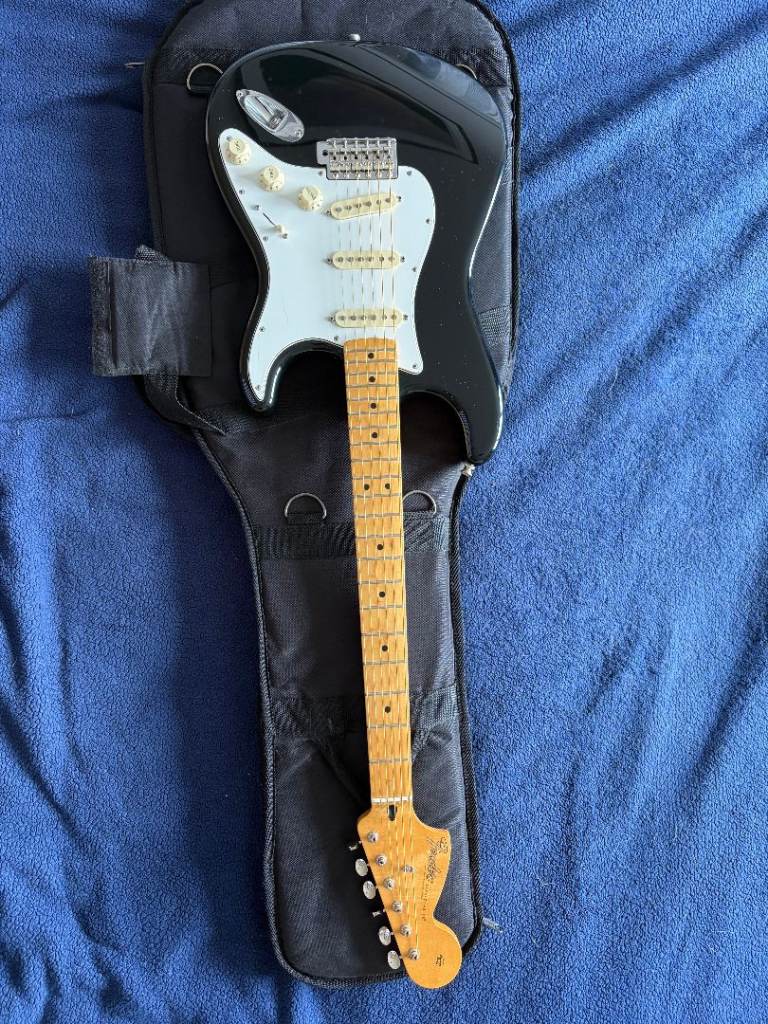 Fender "Jimi Hendrix" Stratocaster in black, c/w gig bag - excellent condition