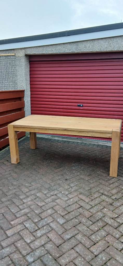 Solid wood dining table