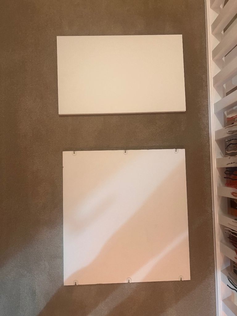 Two ikea shelves and white metod cabinet door