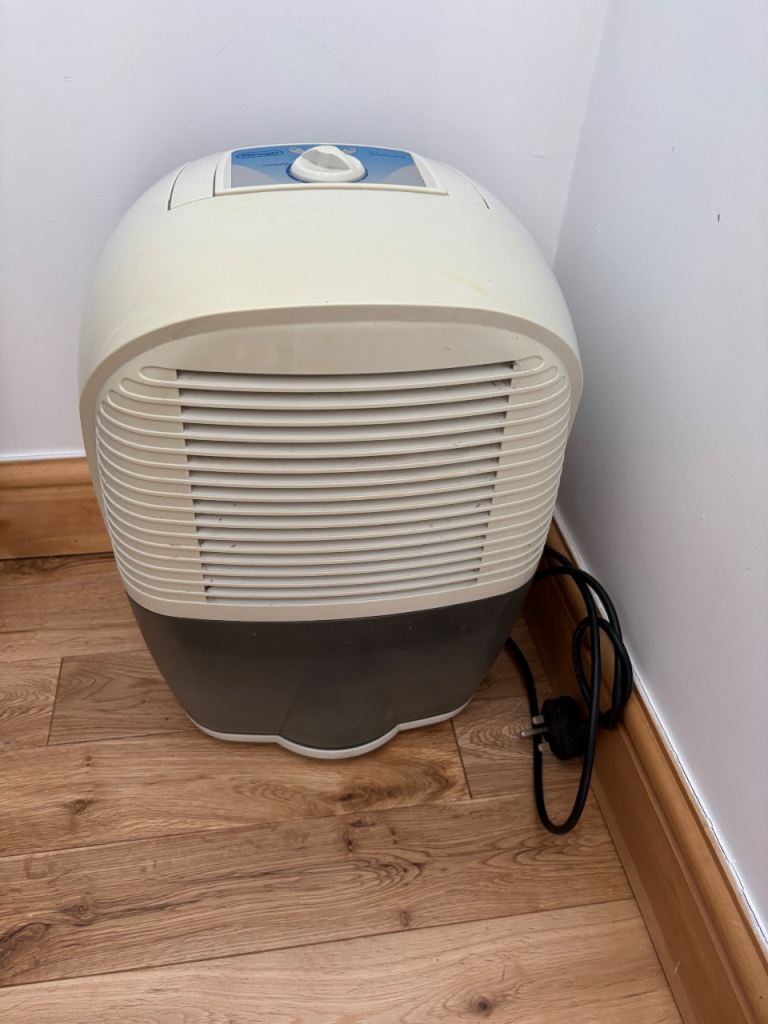 Delonghi Dehumidifier - beige , Good Condition
