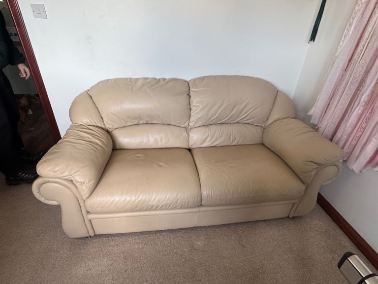 Cream leather 2 seater sofa bed