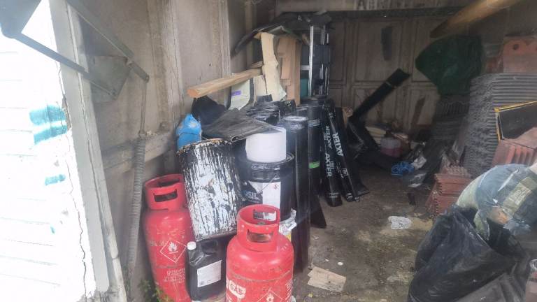 Roofing materials garage clearance. 