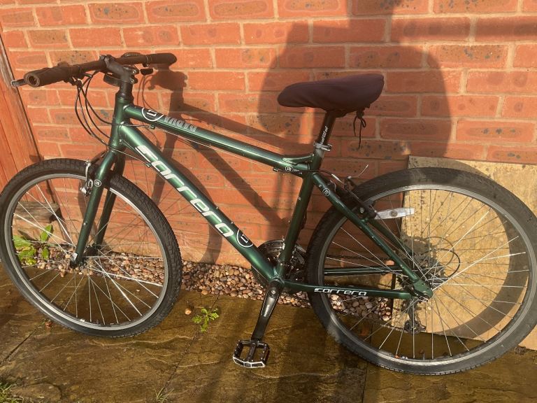 used green carerra hybrid mountain bike 