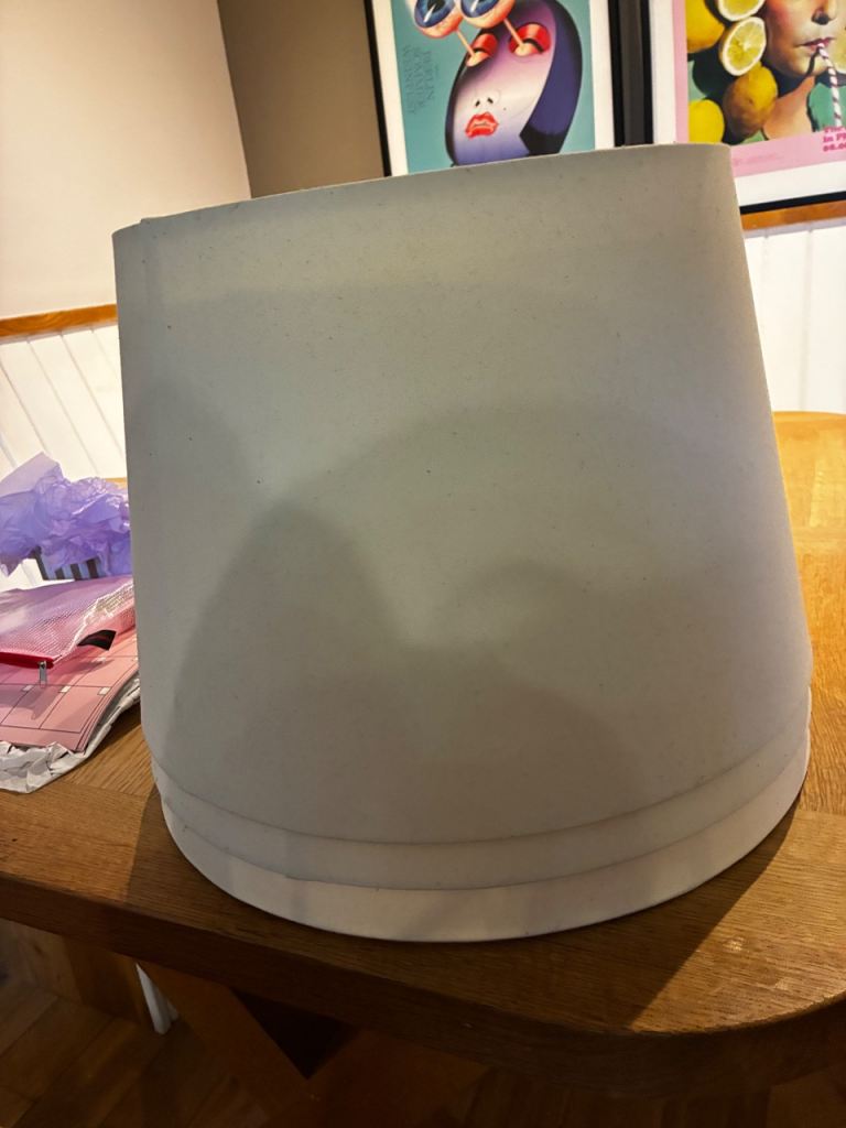 Three large ceiling lamp shades