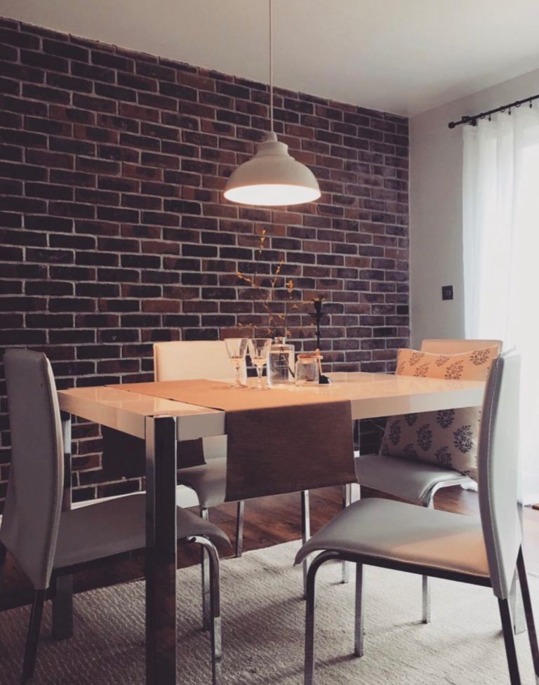 White gloss dining table with 4 faux leather chairs