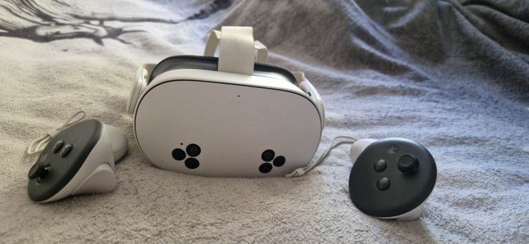 Meta Quest 3s VR headset and controllers 