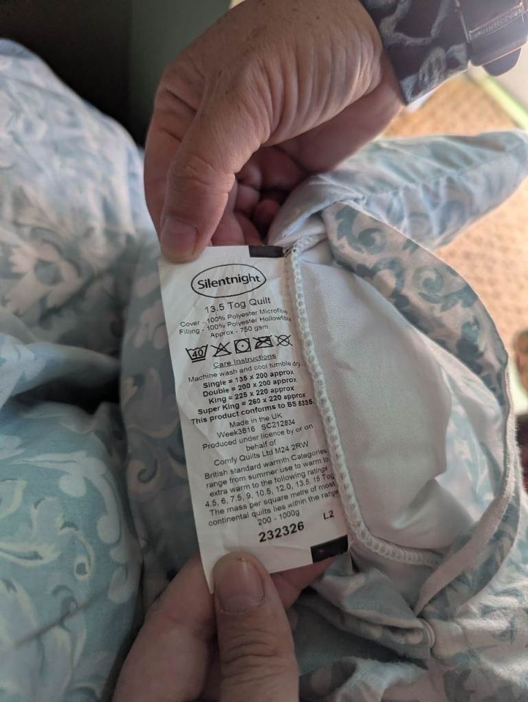 King size quilt and two pillows with covers