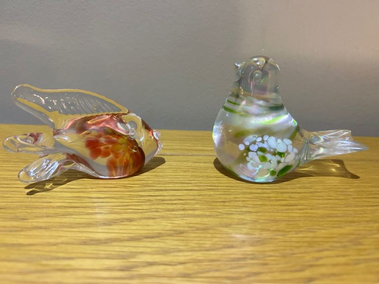 Decorative hand-blown glass ornaments-  colourful fish and an iridescent bird with floral finish