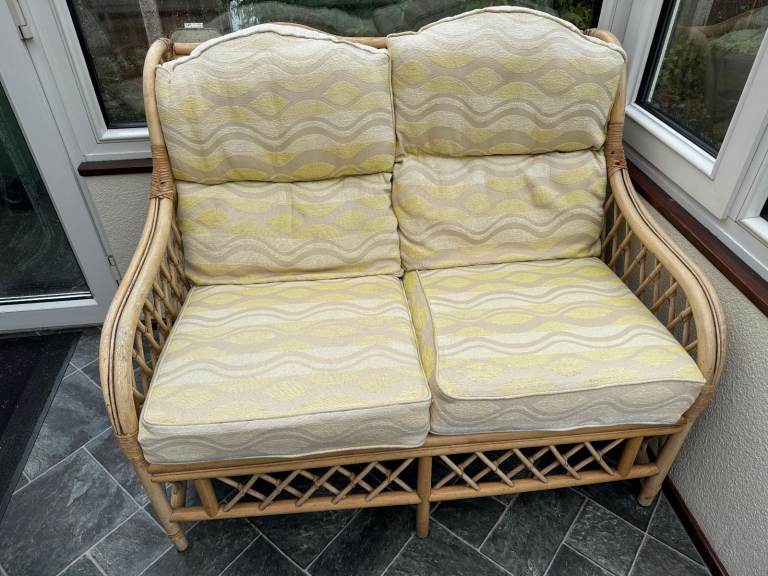 Cane 2 seater sofa, 2 matching chairs and cane table