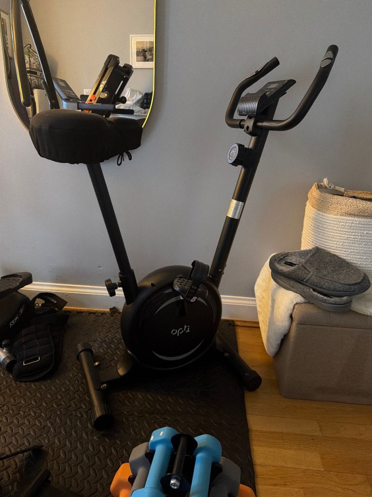 OPTI magnetic exercise bike including cushion on seat