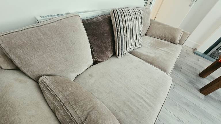 Beige velvetty sofa