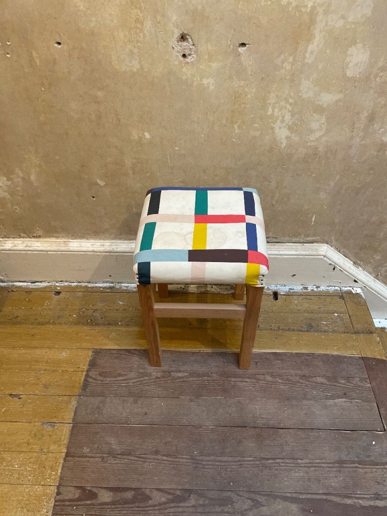 FREE Mondrian style hand-upholstered stool