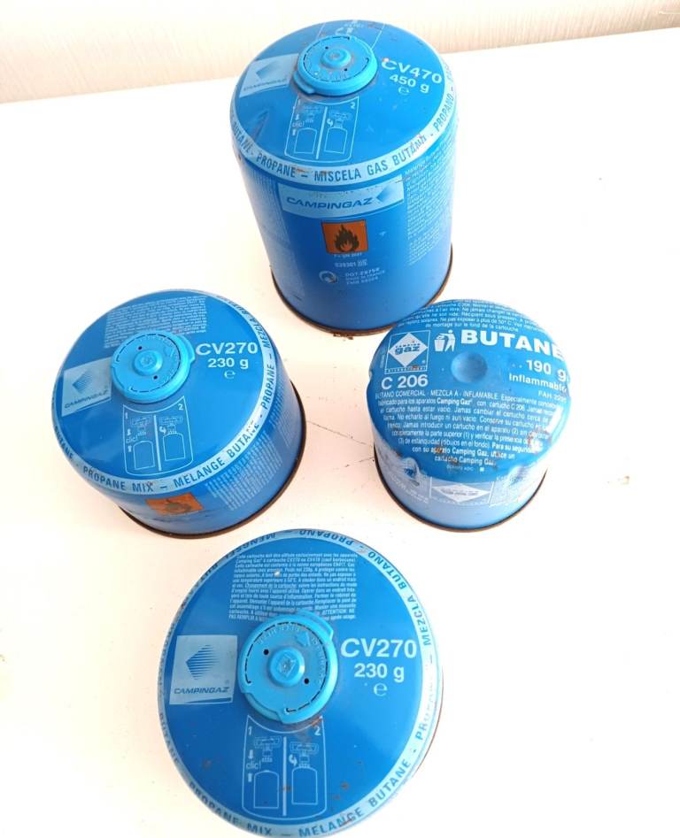 Varying gas cannisters (4 x full) and 1 x empty larger cannister (see photos) -Northwood HA6