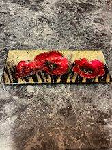 Candle holder - poppy design. Holds 3 tealights. Nice gift