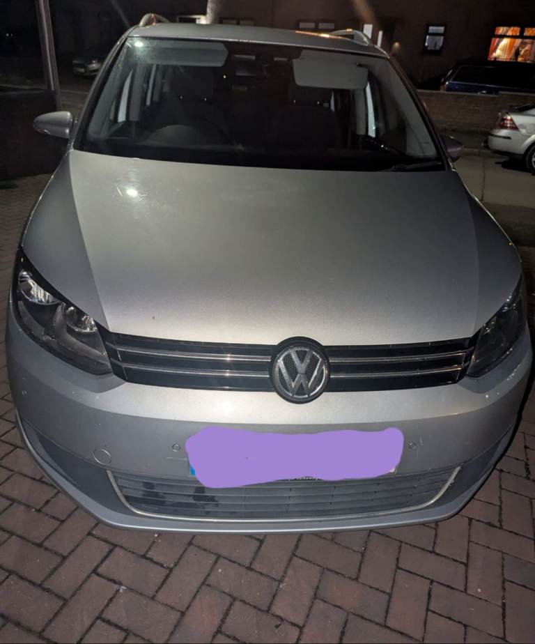 Silver touran 7 seater