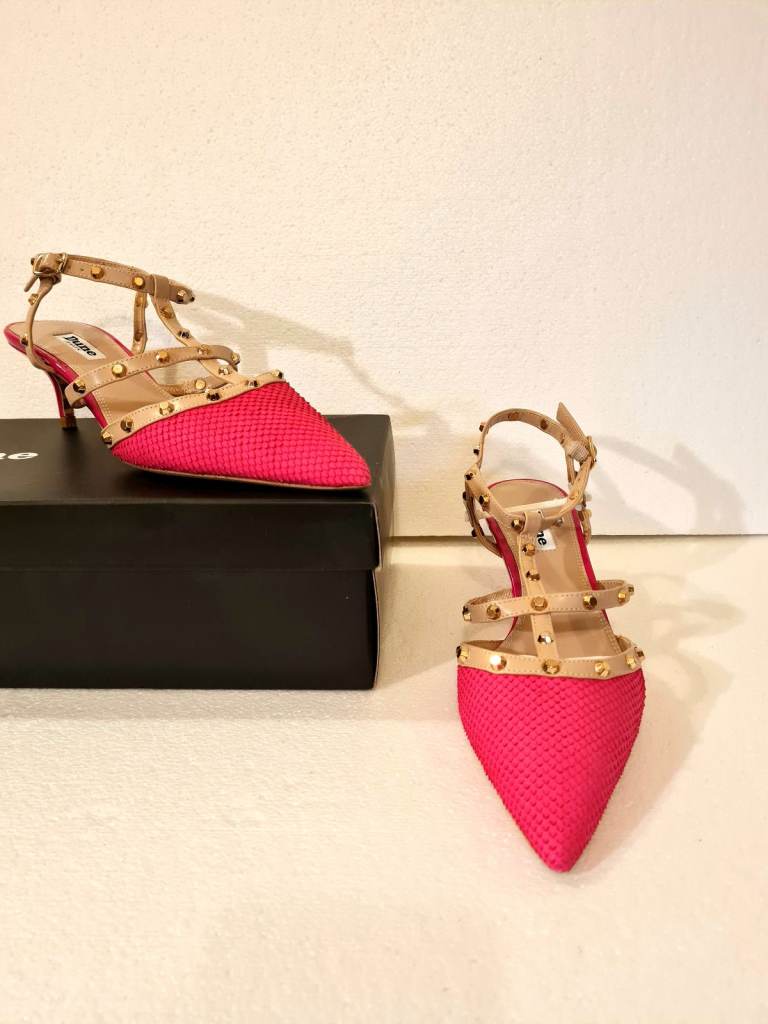Snake skin strappy heels. 