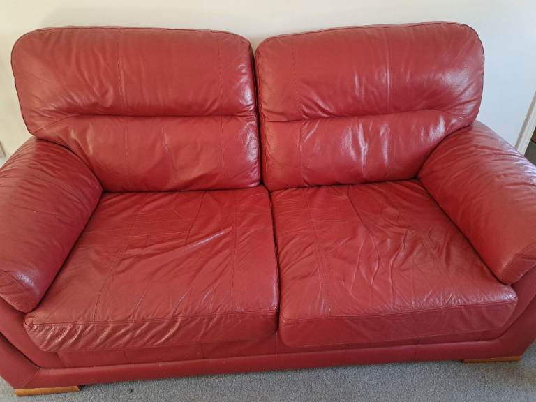 Red Leather Two-Seater Sofa – Good Condition