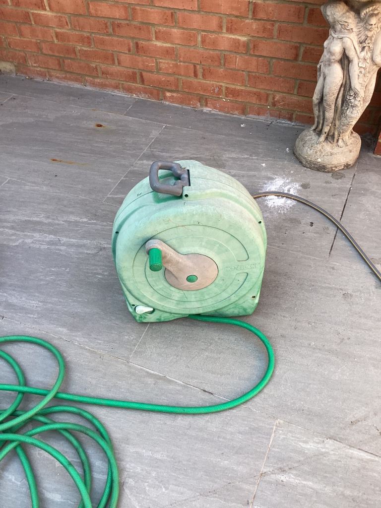 Garden hose pipe on reel 