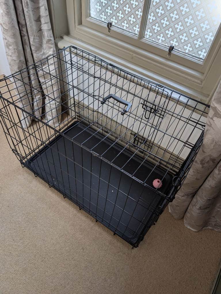 Medium dog crate as new 