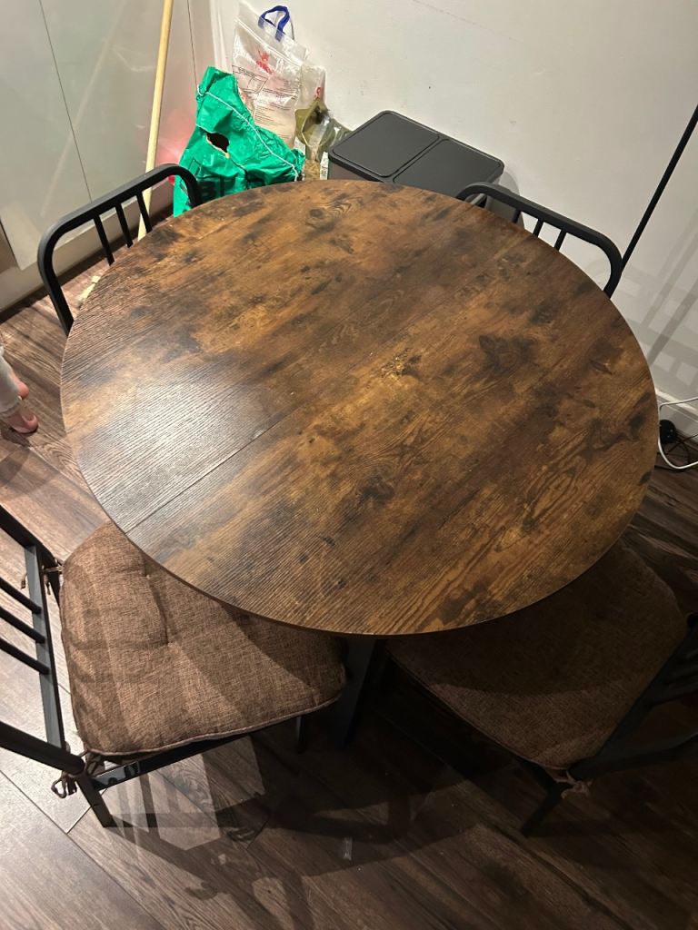 Oak dining table and chairs 